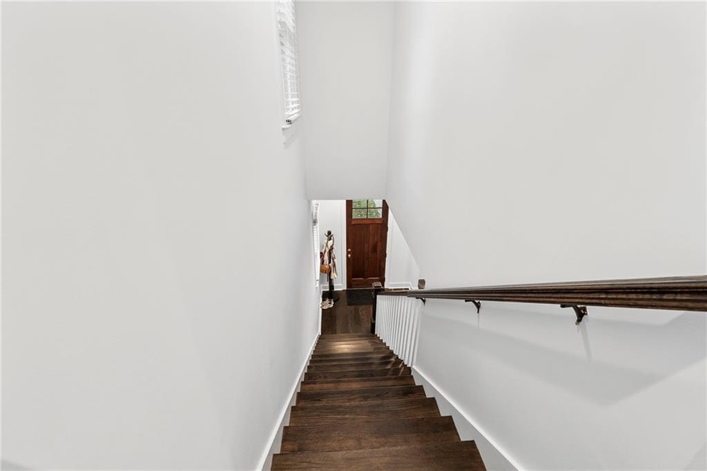 1771 Derry Avenue Southwest Atlanta, GA 30310 - Photo 32 of 45 a view of a hallway with wooden floor and staircase