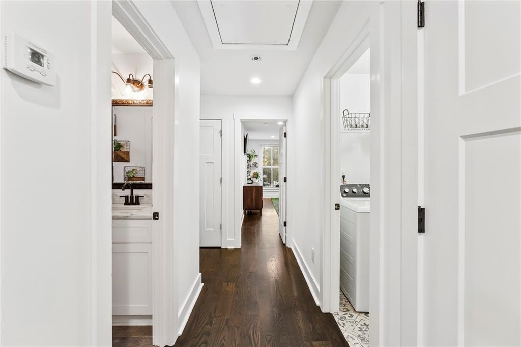1771 Derry Avenue Southwest Atlanta, GA 30310 - Photo 35 of 45 a view of a hallway with wooden floor and staircase