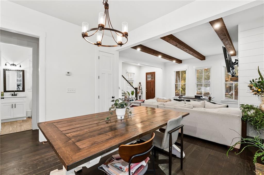 1771 Derry Avenue Southwest Atlanta, GA 30310 - Photo 5 of 45 a view of a dining room with furniture and wooden floor