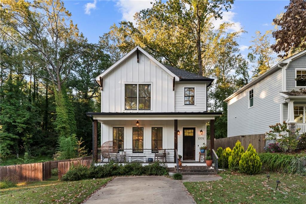 1771 Derry Avenue Southwest Atlanta, GA 30310 - Photo 8 of 45 a front view of a house with garden