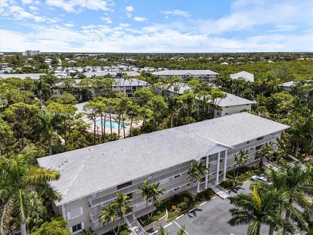 3012 Sandpiper Bay Circle, Unit D101 Naples, FL 34112 - Photo 25 of 27 an aerial view of a house