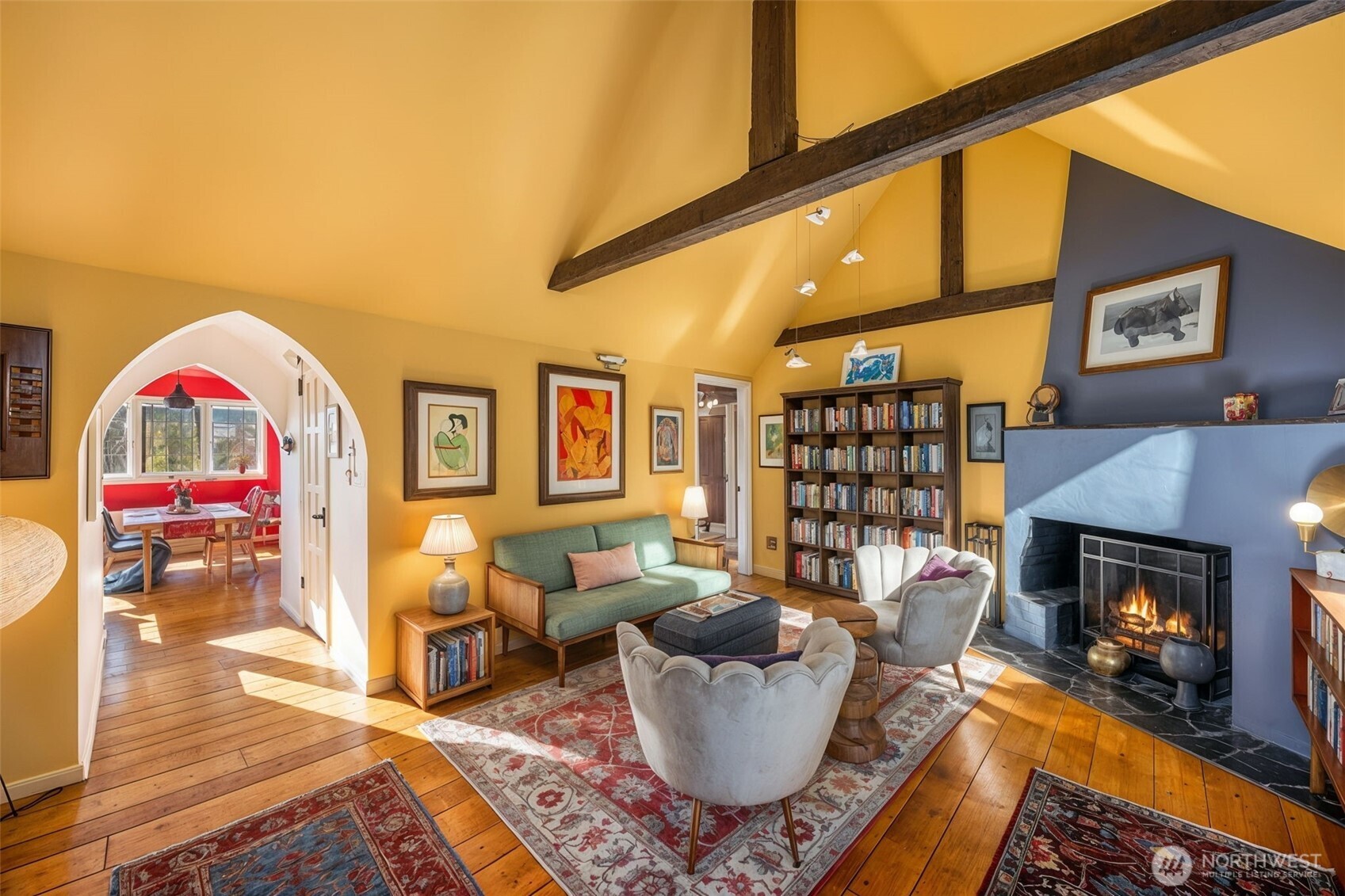 1014 East Roy Street, Unit 35 Seattle, WA 98102 - Photo 1 of 18 a living room with furniture and a fireplace