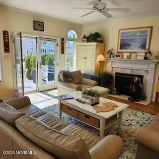 a living room with furniture and a fireplace