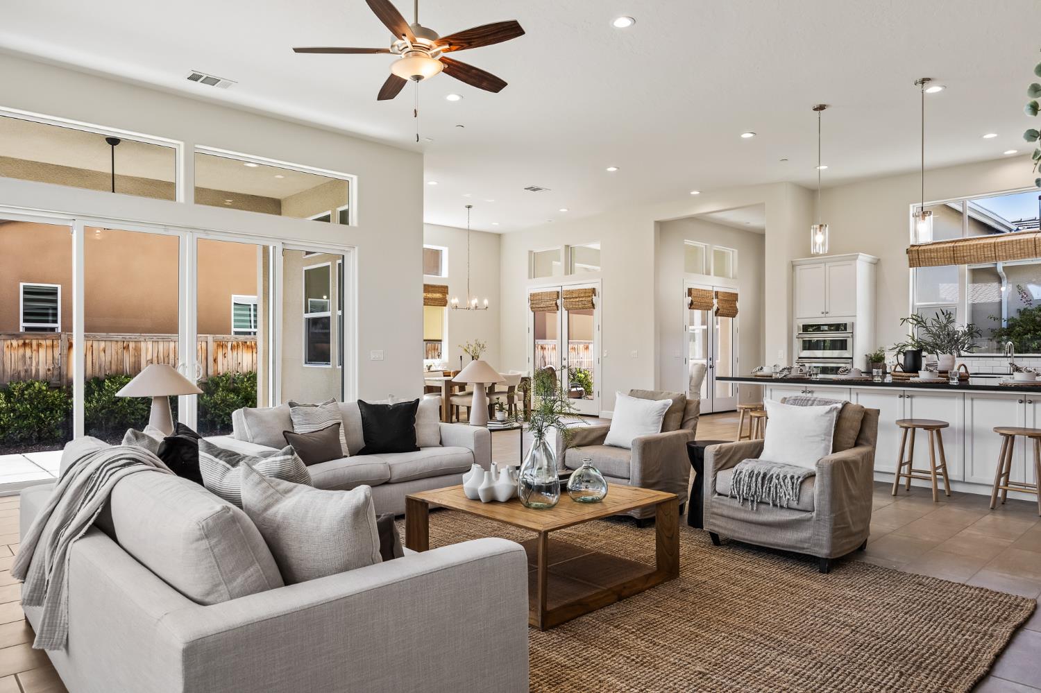 998 Highland Road West Madera, CA 93636 - Photo 16 of 61 a living room with furniture kitchen view and a large window