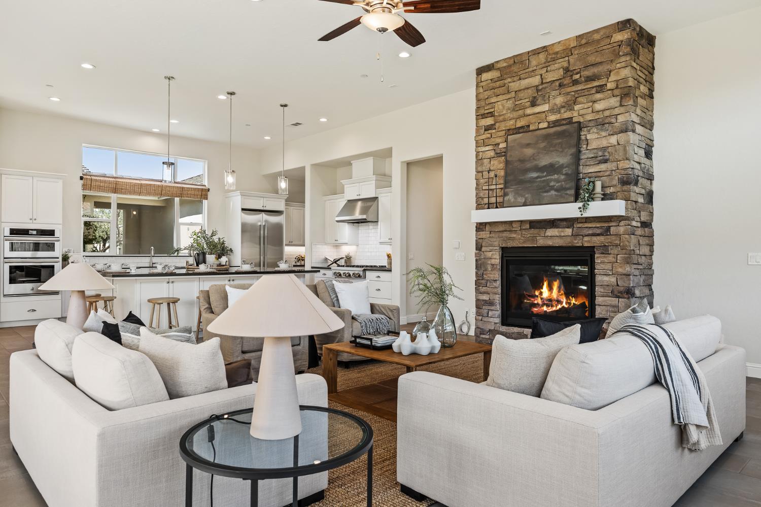 998 Highland Road West Madera, CA 93636 - Photo 22 of 61 a living room with furniture and a fireplace