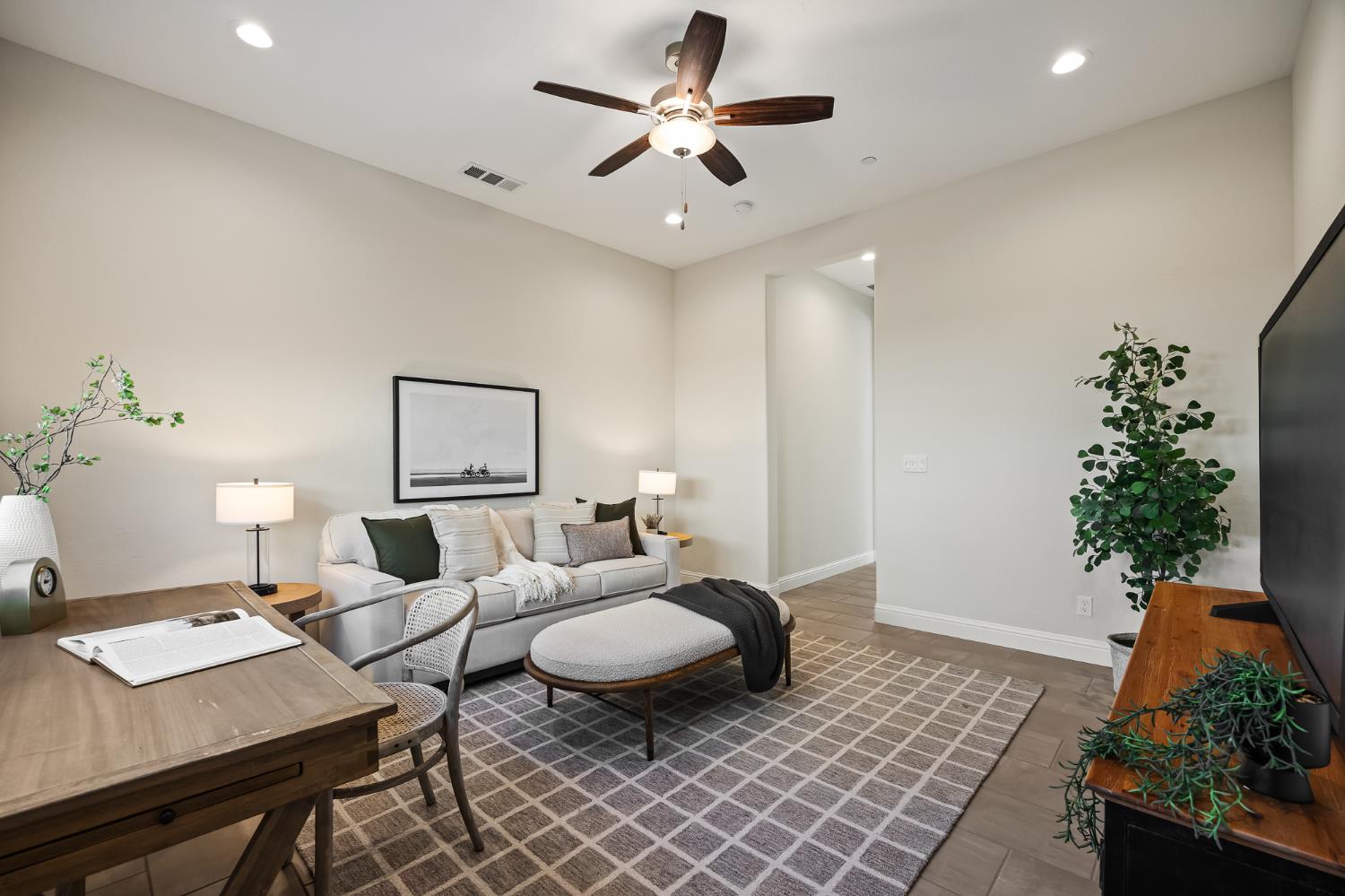 998 Highland Road West Madera, CA 93636 - Photo 31 of 61 a living room with furniture and a potted plant