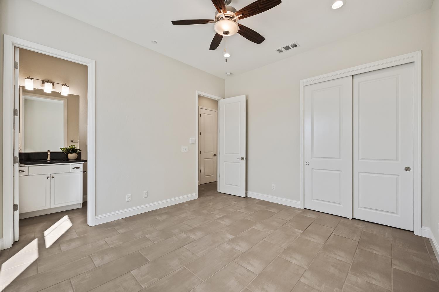 998 Highland Road West Madera, CA 93636 - Photo 36 of 61 a view of an empty room and window