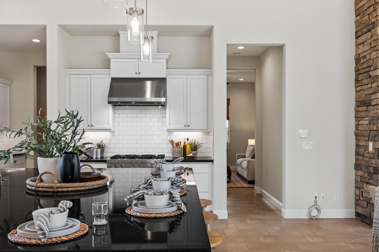 998 Highland Road West Madera, CA 93636 - Photo 9 of 61 a kitchen with a refrigerator and a stove