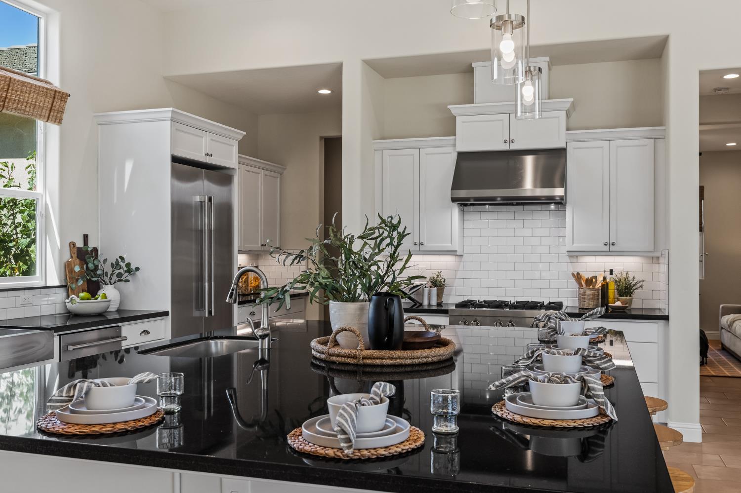 998 Highland Road West Madera, CA 93636 - Photo 10 of 61 a kitchen with a sink and stove