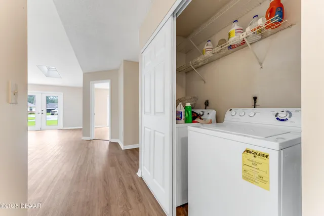 a utility room with dryer and washer