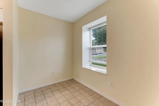 a view of an empty room with window