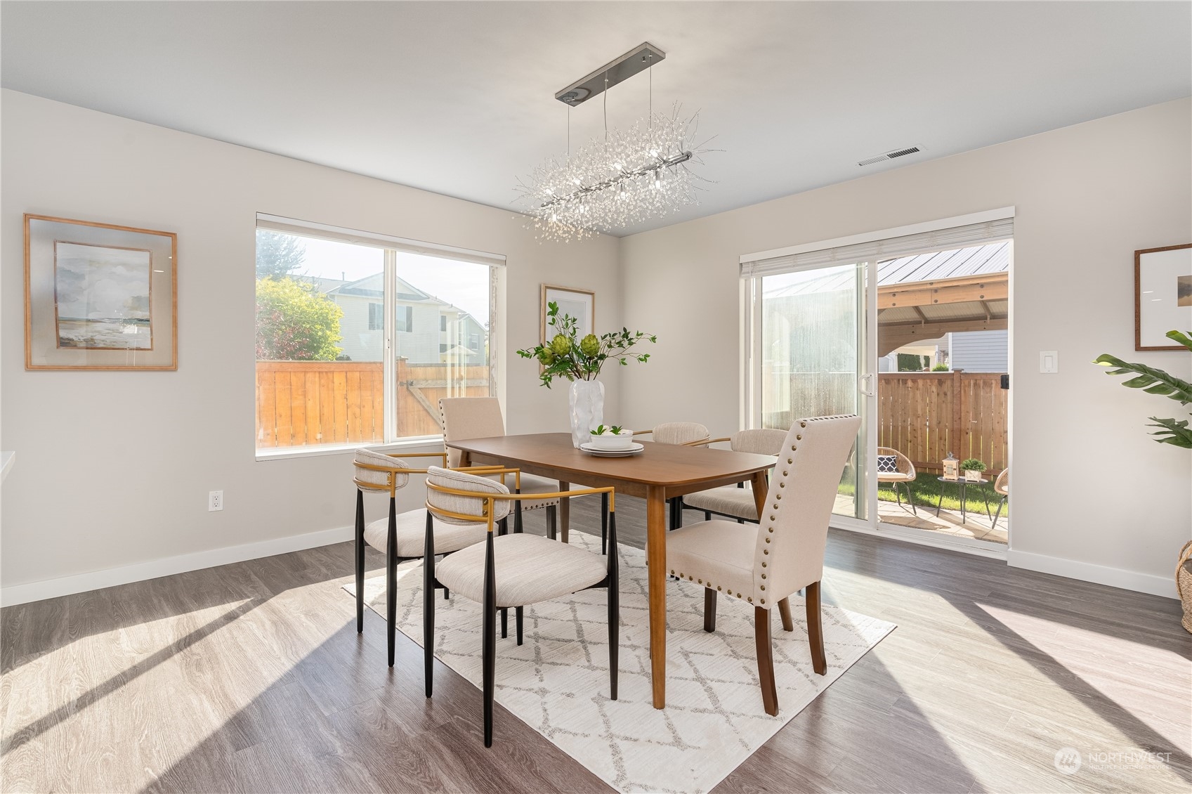 15030 38th Drive Southeast Bothell, WA 98012 - Photo 11 of 37 a view of a dining room with furniture and wooden floor