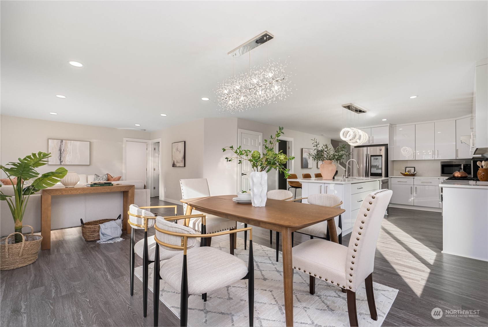 15030 38th Drive Southeast Bothell, WA 98012 - Photo 12 of 37 a view of a dining room with furniture and wooden floor