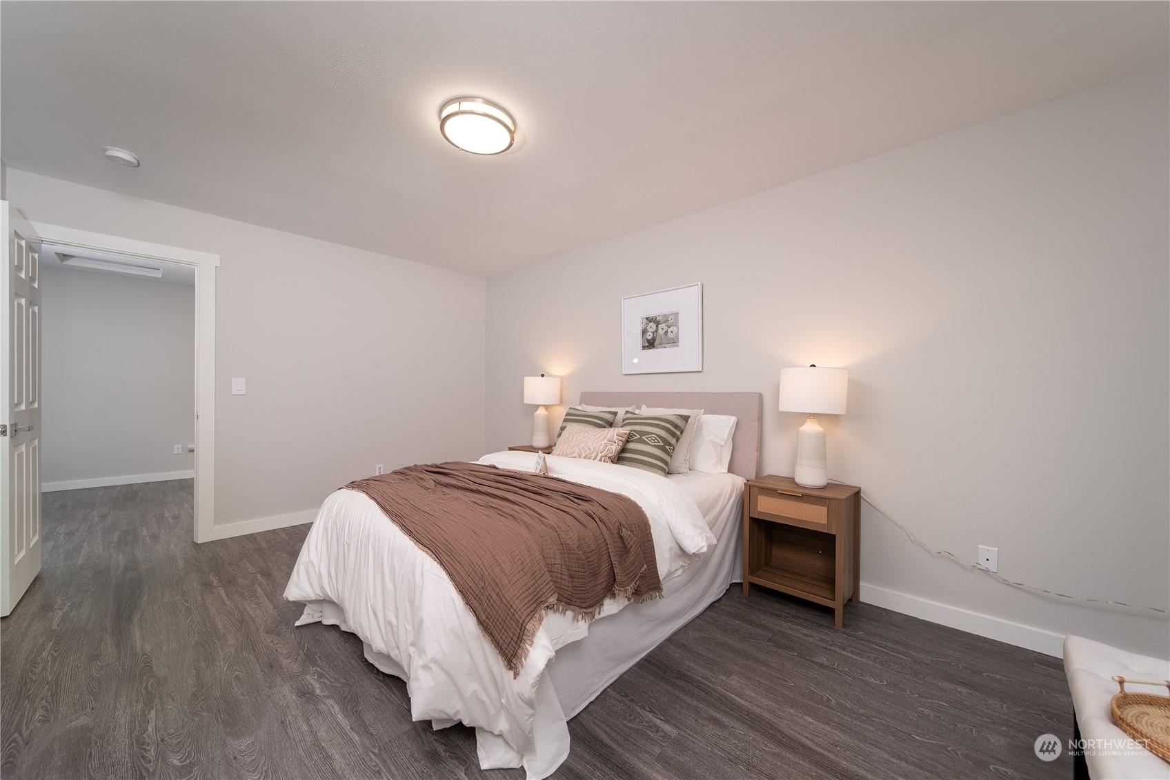 15030 38th Drive Southeast Bothell, WA 98012 - Photo 26 of 37 a bedroom with a bed and a night stand