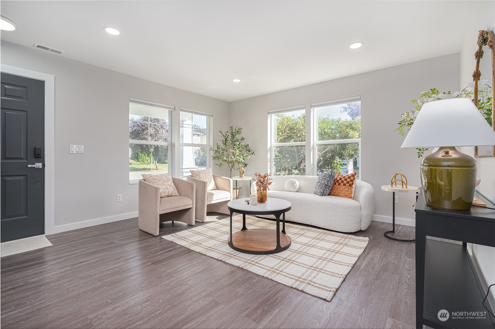 15030 38th Drive Southeast Bothell, WA 98012 - Photo 5 of 37 a living room with furniture and a table