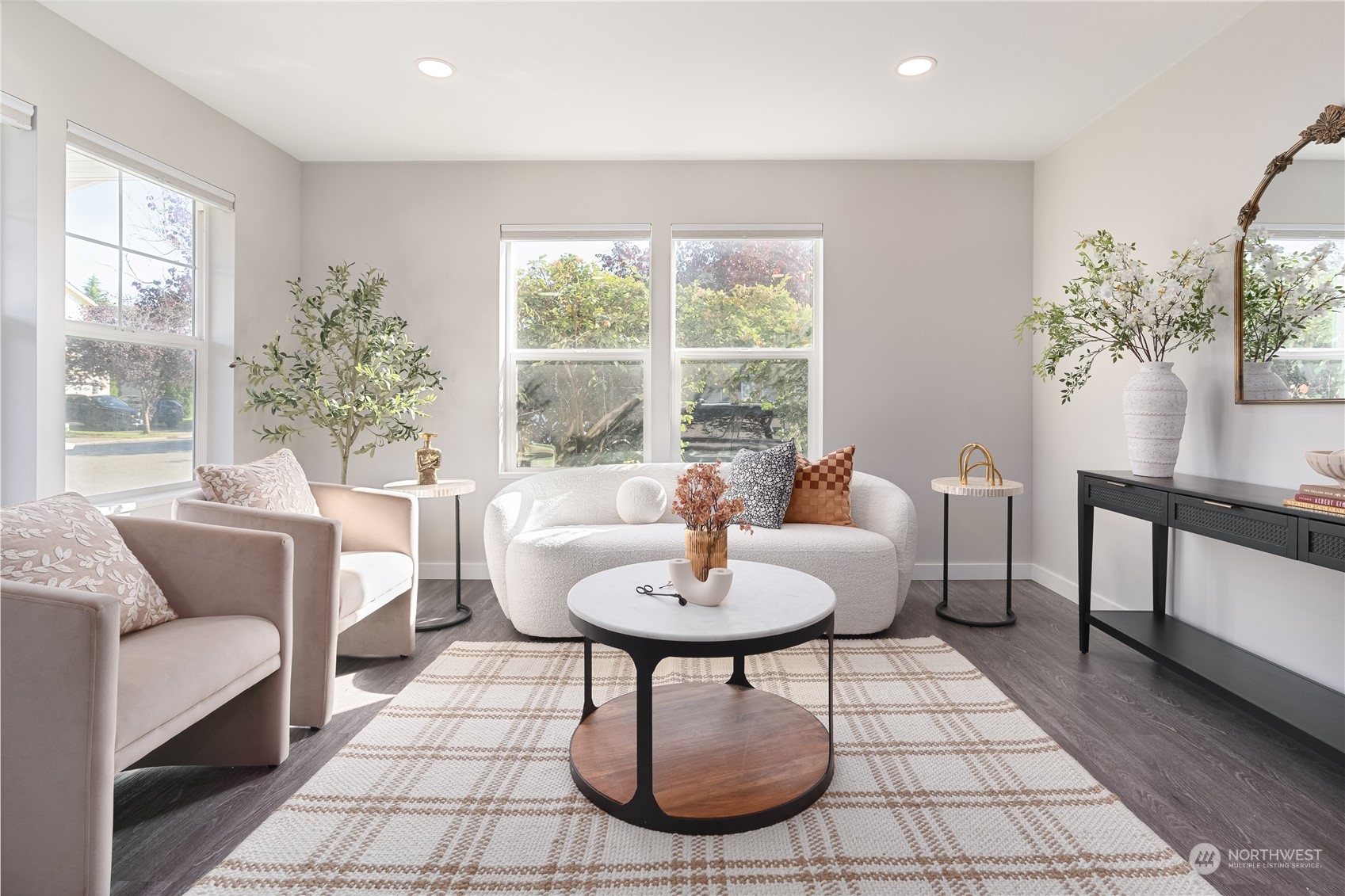 15030 38th Drive Southeast Bothell, WA 98012 - Photo 6 of 37 a living room with furniture a window and a potted plant
