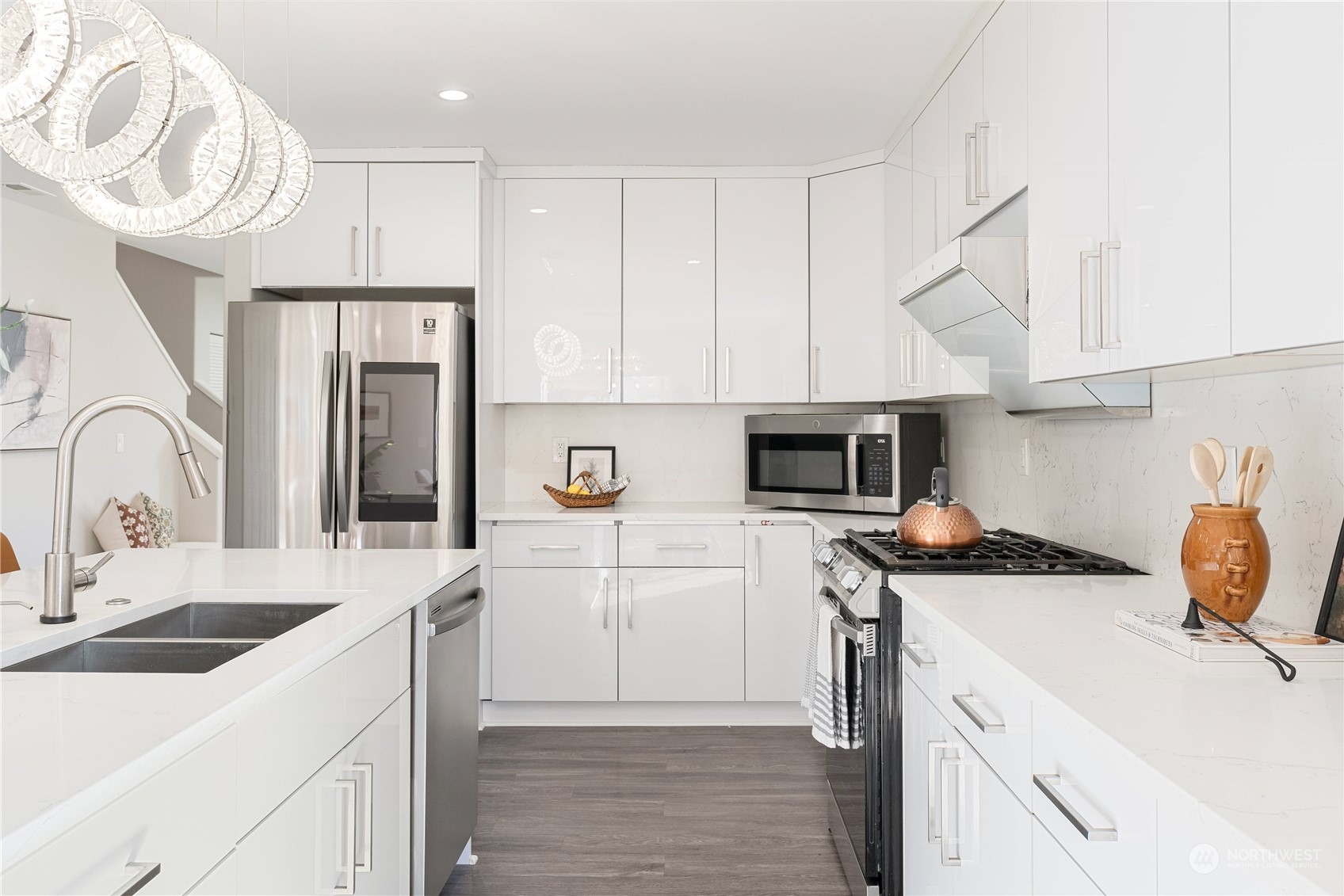 15030 38th Drive Southeast Bothell, WA 98012 - Photo 9 of 37 a kitchen with a sink a stove and refrigerator