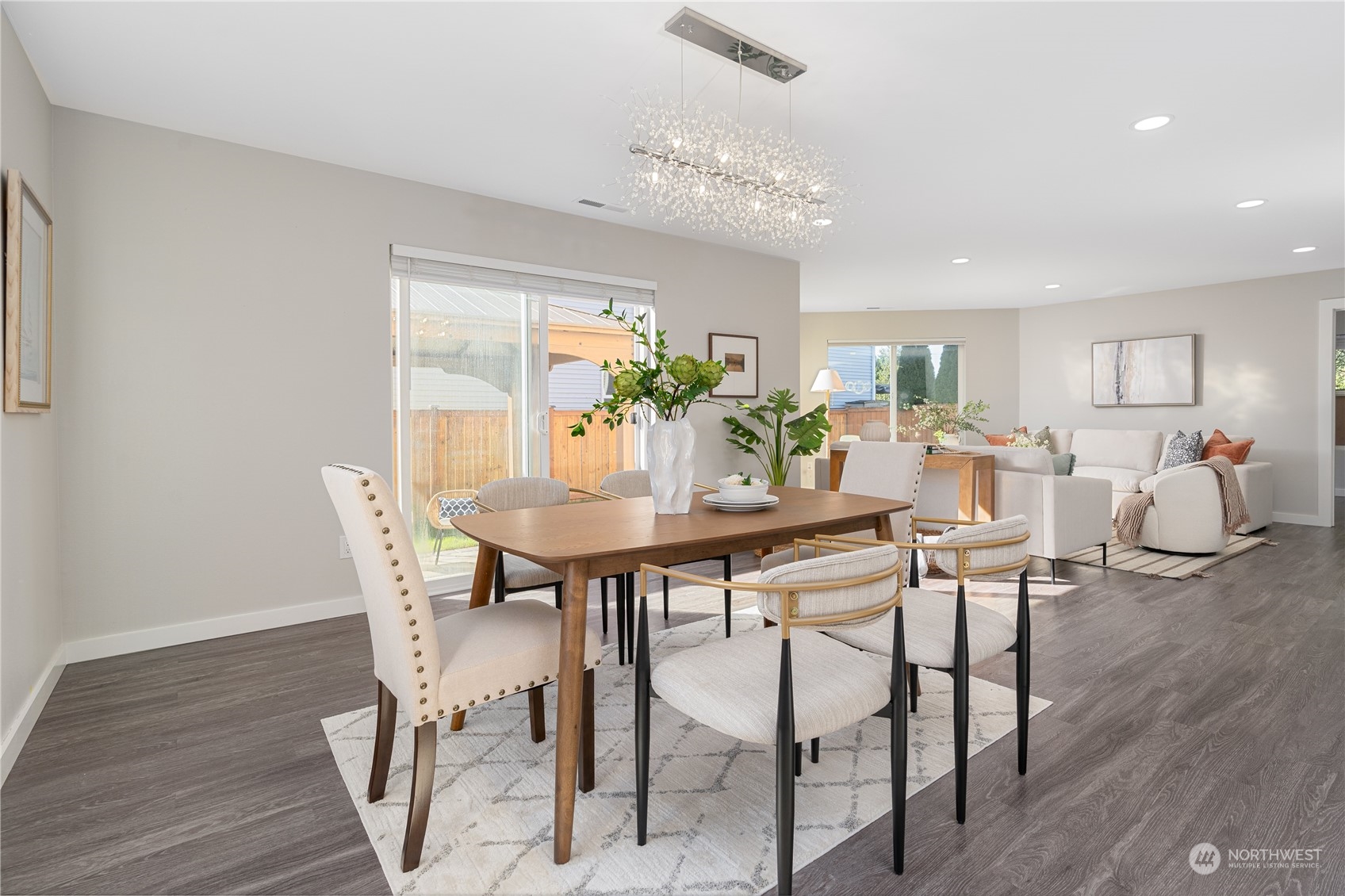15030 38th Drive Southeast Bothell, WA 98012 - Photo 10 of 37 a view of a dining room with furniture and wooden floor