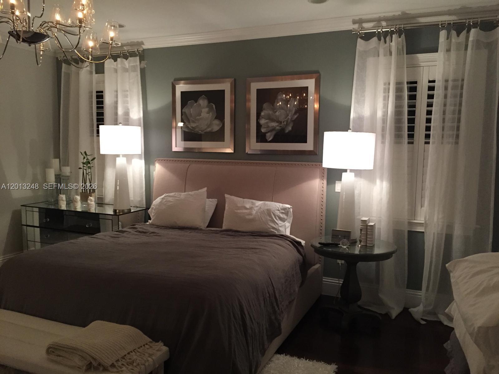 5000 Southwest 73rd Terrace Miami, FL 33143 - Photo 11 of 24 a bed room with a bed and a lamp