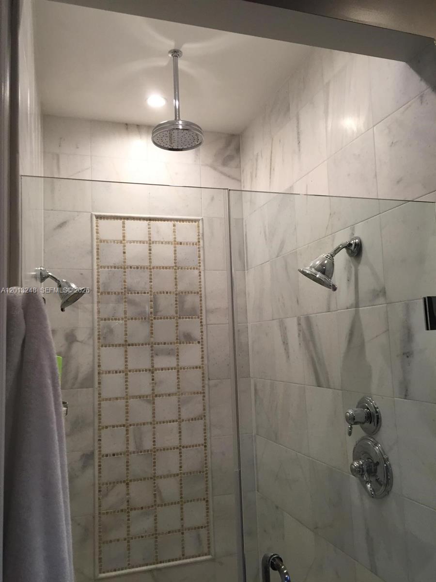 5000 Southwest 73rd Terrace Miami, FL 33143 - Photo 17 of 24 a bathroom with a shower