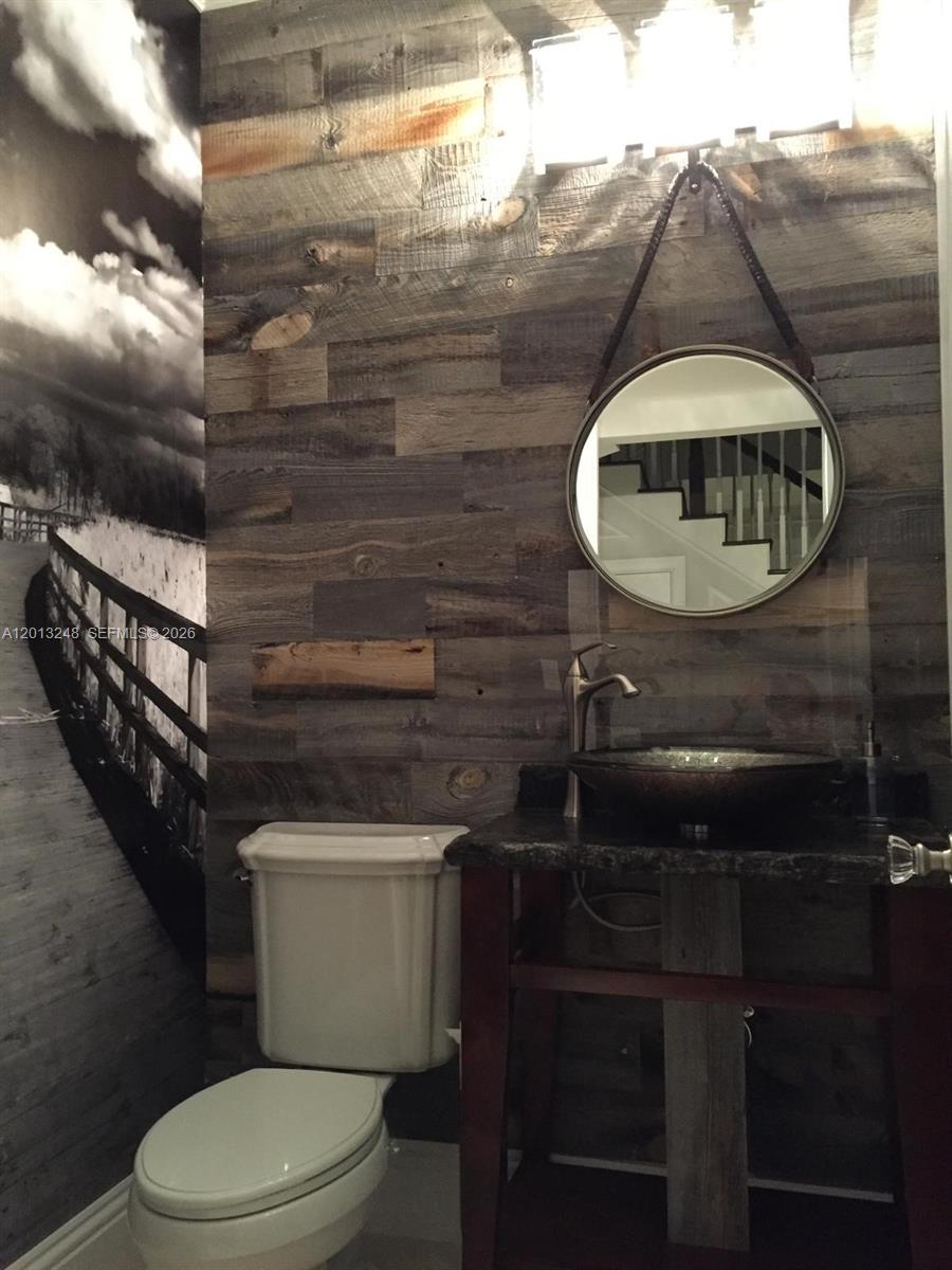 5000 Southwest 73rd Terrace Miami, FL 33143 - Photo 18 of 24 a bathroom with a toilet