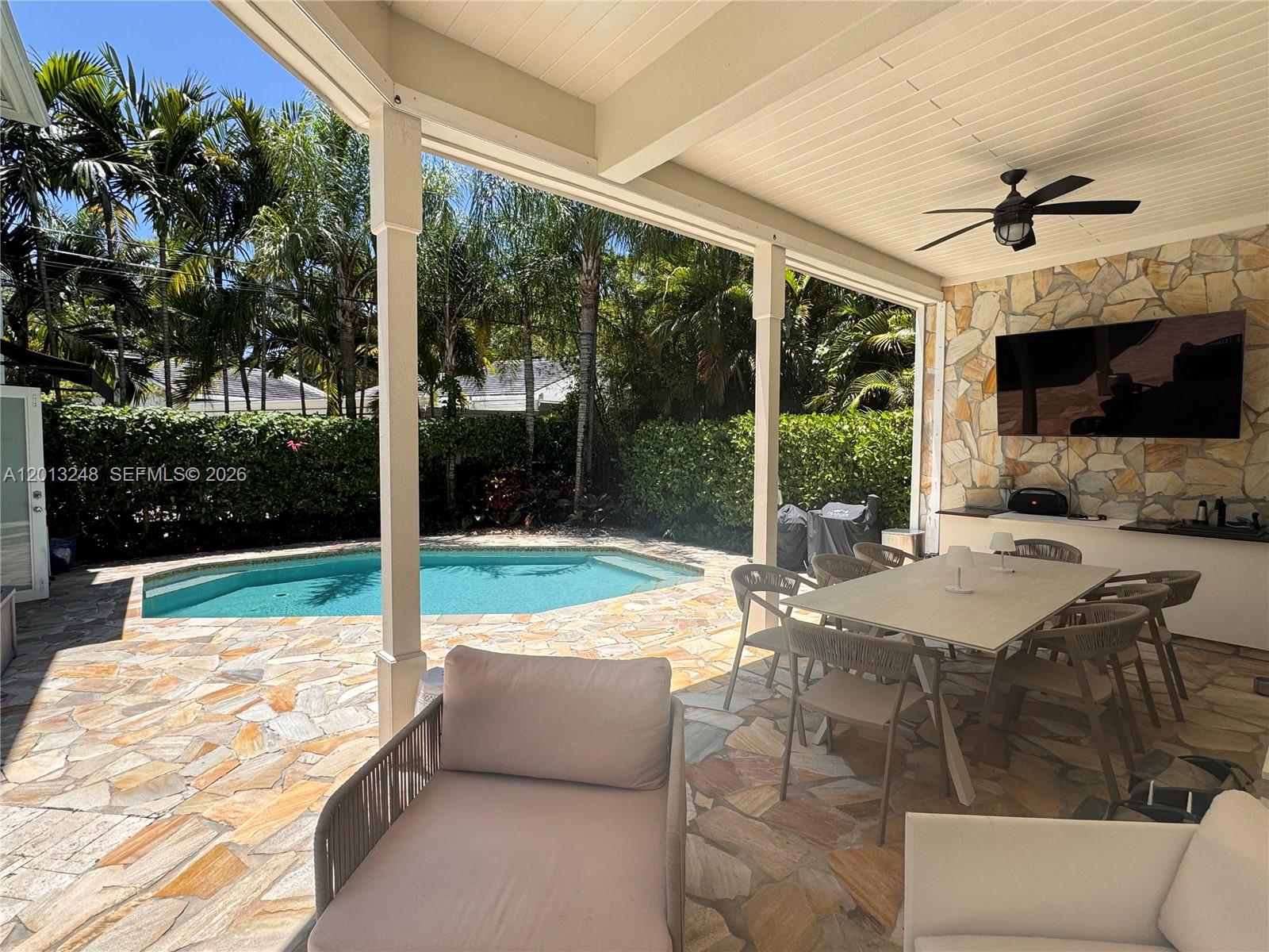 5000 Southwest 73rd Terrace Miami, FL 33143 - Photo 21 of 24 a view of a patio with swimming pool