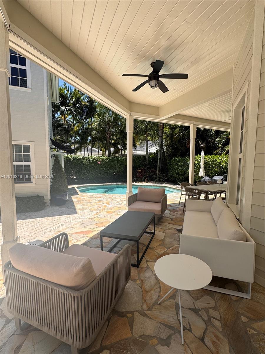 5000 Southwest 73rd Terrace Miami, FL 33143 - Photo 22 of 24 a outdoor living space with furniture and garden view