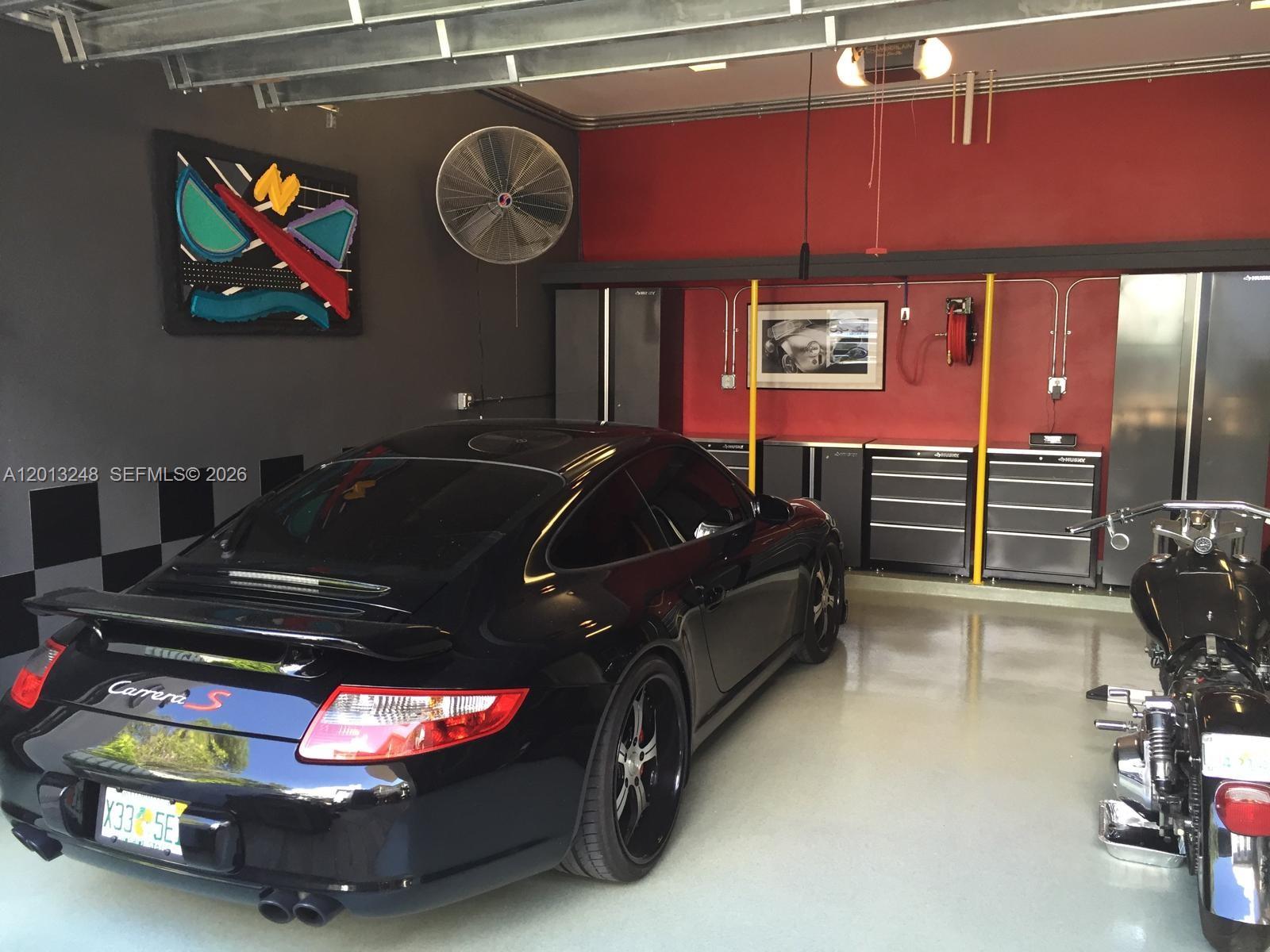 5000 Southwest 73rd Terrace Miami, FL 33143 - Photo 23 of 24 a car parked in a parking room