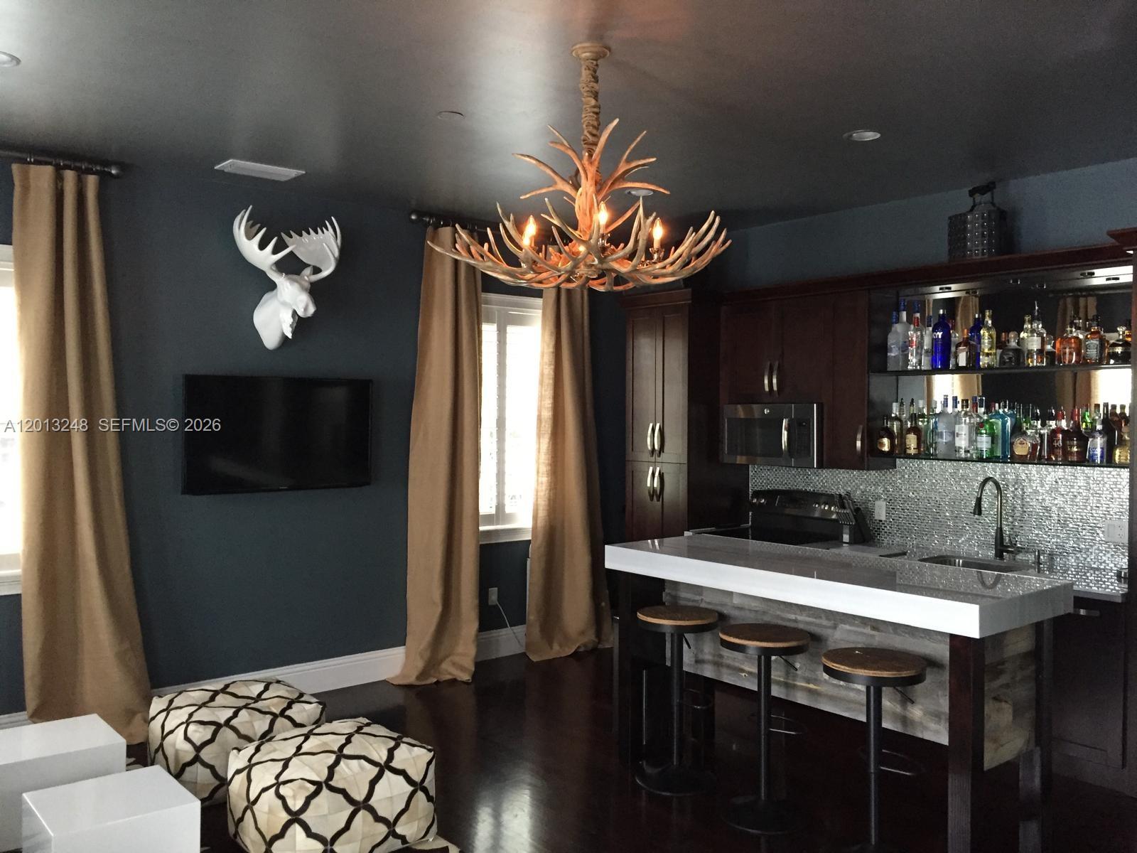 5000 Southwest 73rd Terrace Miami, FL 33143 - Photo 24 of 24 a kitchen with a table and chairs