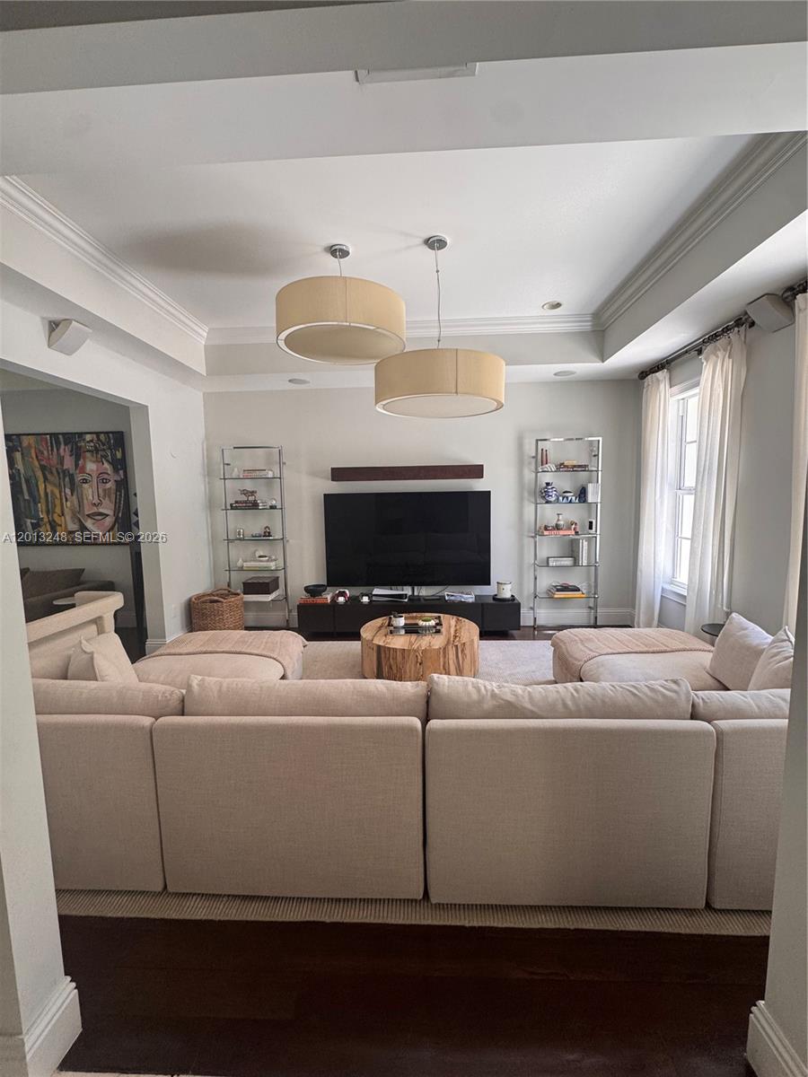 5000 Southwest 73rd Terrace Miami, FL 33143 - Photo 5 of 24 a living room with furniture and a flat screen tv