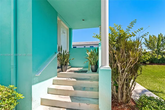 a kitchen with appliances and cabinets