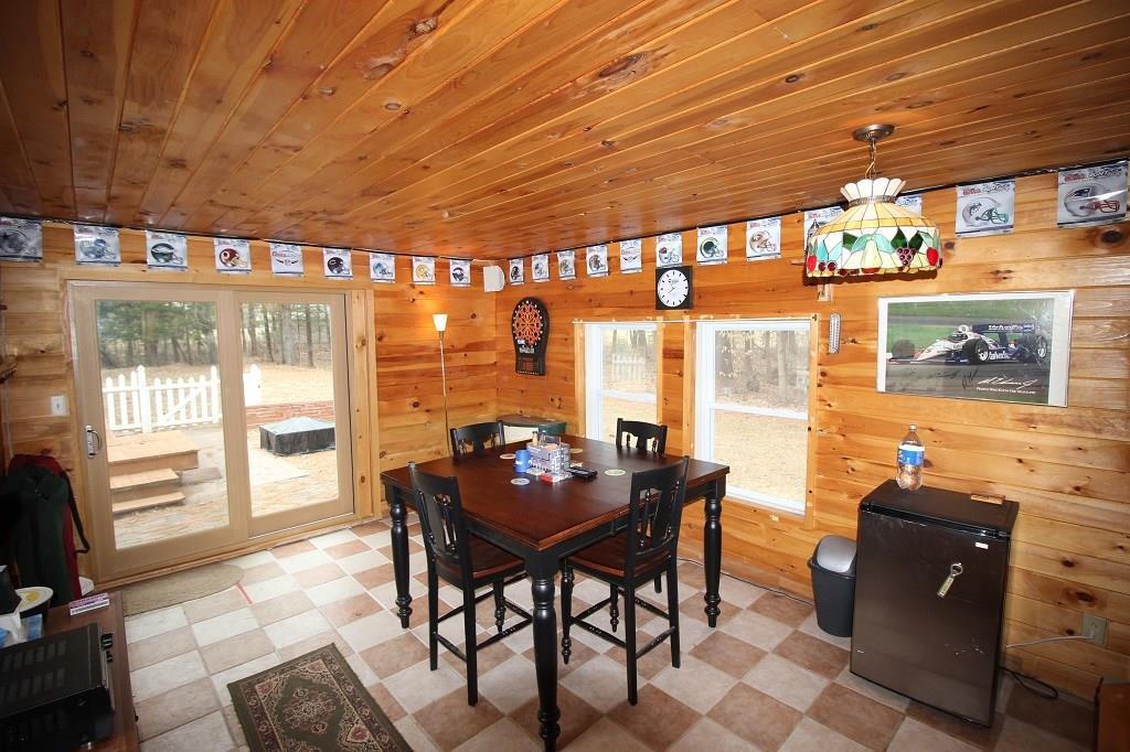 19 Hodgdon Road Levant, ME 04456 - Photo 21 of 35 This sun room off of the back of the...