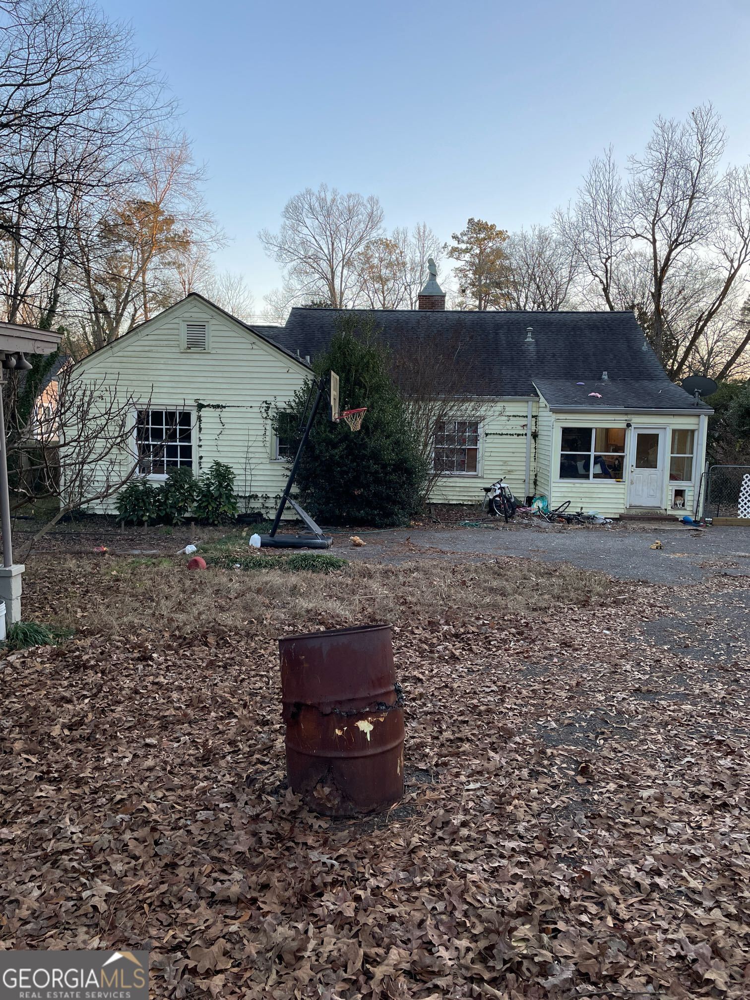 108 Charlton Street Northwest Rome, GA 30165 - Photo 2 of 7 a view of a house with a yard and hanging chair