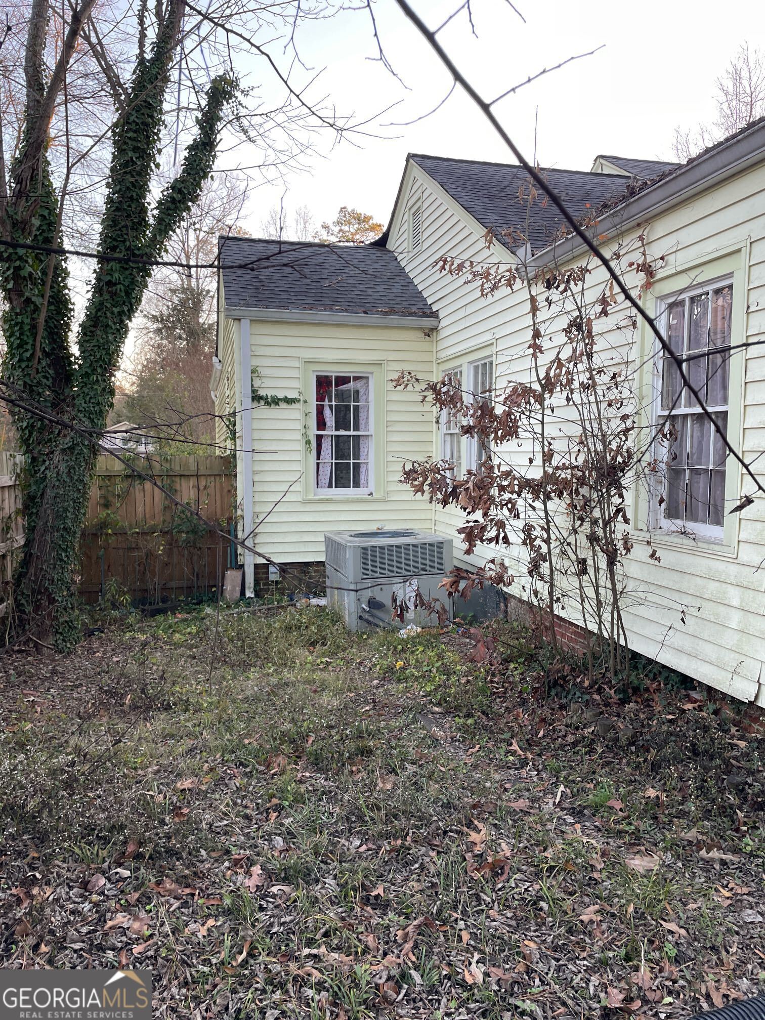 108 Charlton Street Northwest Rome, GA 30165 - Photo 3 of 7 a view of a house with a yard