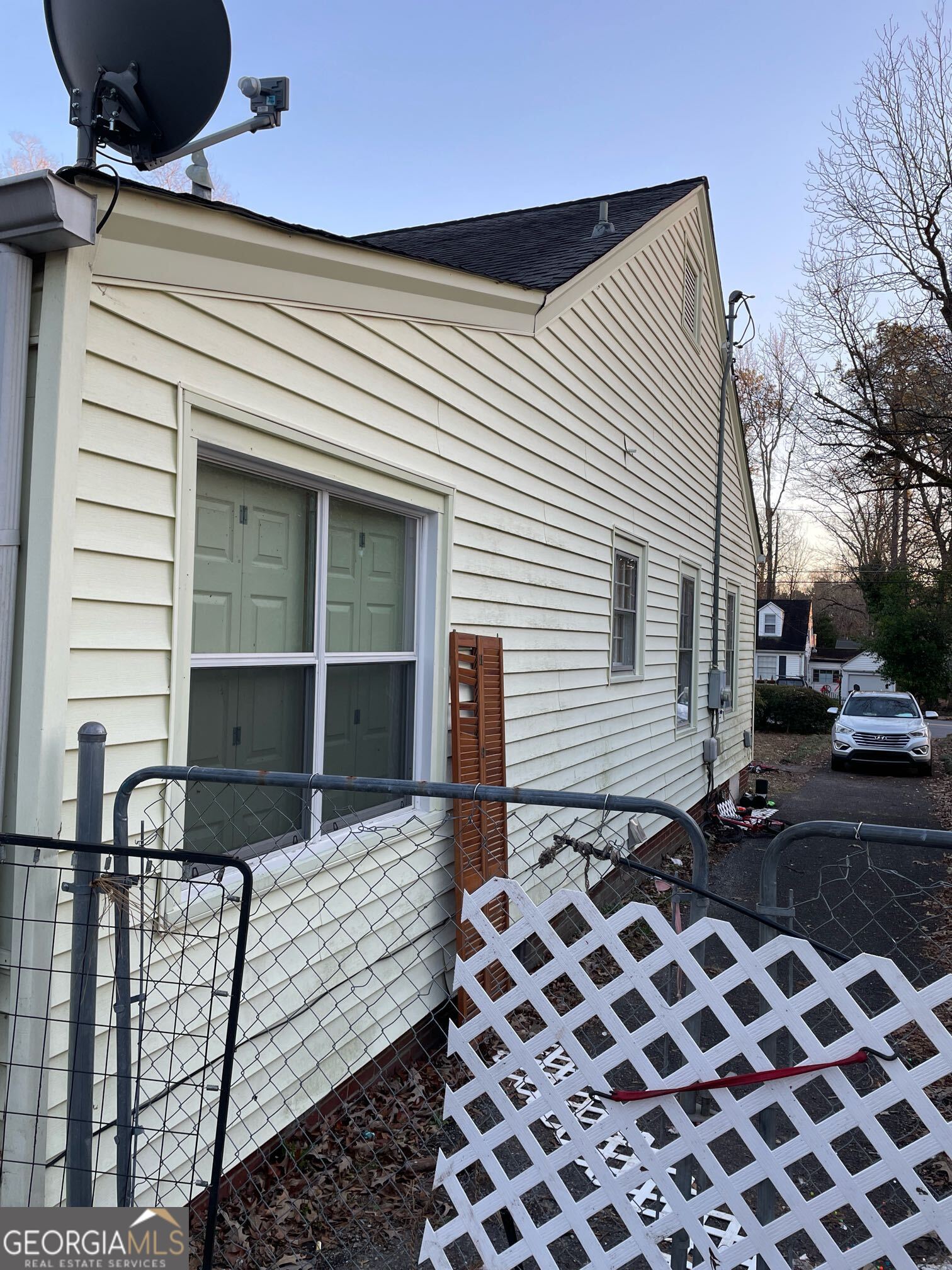 108 Charlton Street Northwest Rome, GA 30165 - Photo 4 of 7 a front view of a house with a yard