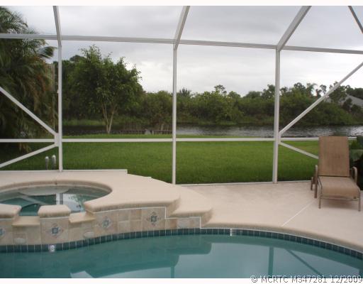 2119 Southwest Oak Ridge Road Palm City, FL 34990 - Photo 16 of 16 View. backyard view to lake