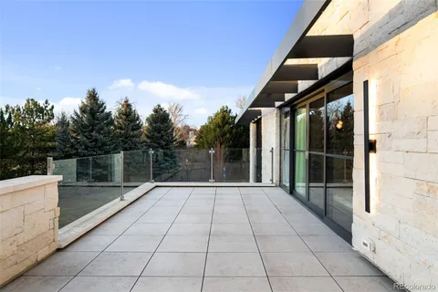 a room with gym equipment and a large window