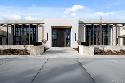 an aerial view of a house with a garden