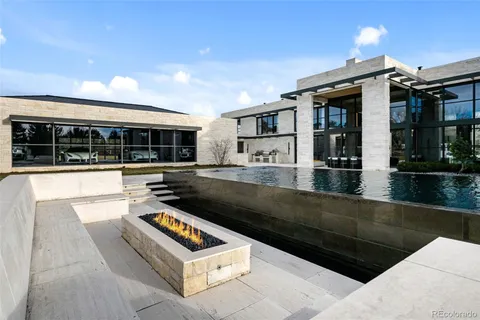 a view of staircase with white walls and windows