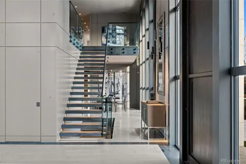 a living room with couches and a view of living room