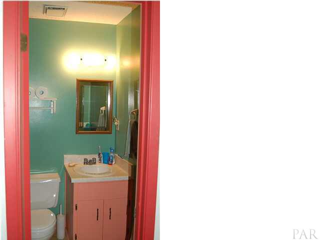 3046 Grady Tolbert Road Navarre, FL 32566 - Photo 13 of 21 Hall bath (tub/shower combo out of view)