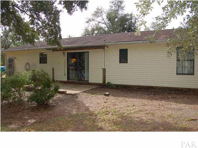 3046 Grady Tolbert Road Navarre, FL 32566 - Photo 3 of 21 Rear view
