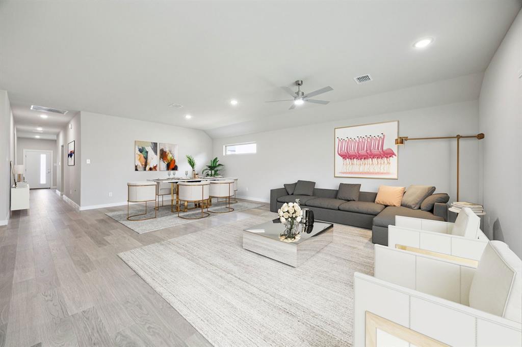 657 Poppy Lane Lavon, TX 75166 - Photo 11 of 28 a living room with furniture and a flat screen tv