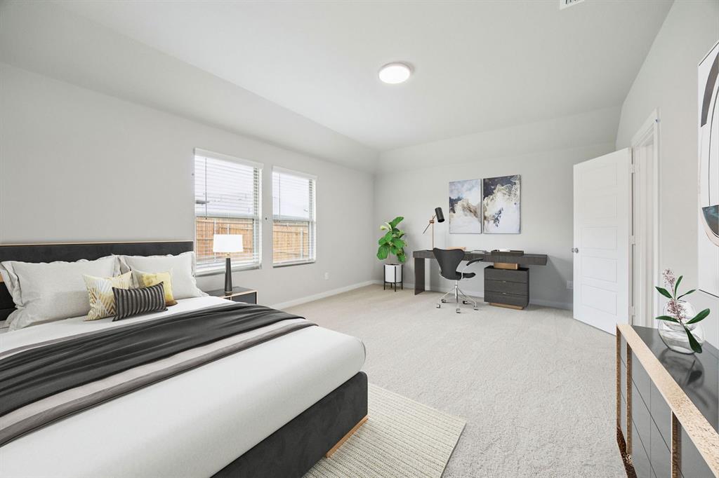 657 Poppy Lane Lavon, TX 75166 - Photo 14 of 28 a spacious bedroom with a bed and furniture