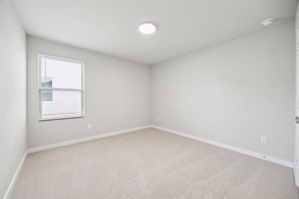 657 Poppy Lane Lavon, TX 75166 - Photo 24 of 28 an empty room with a window