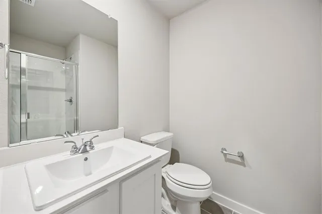 a bathroom with a sink and a toilet