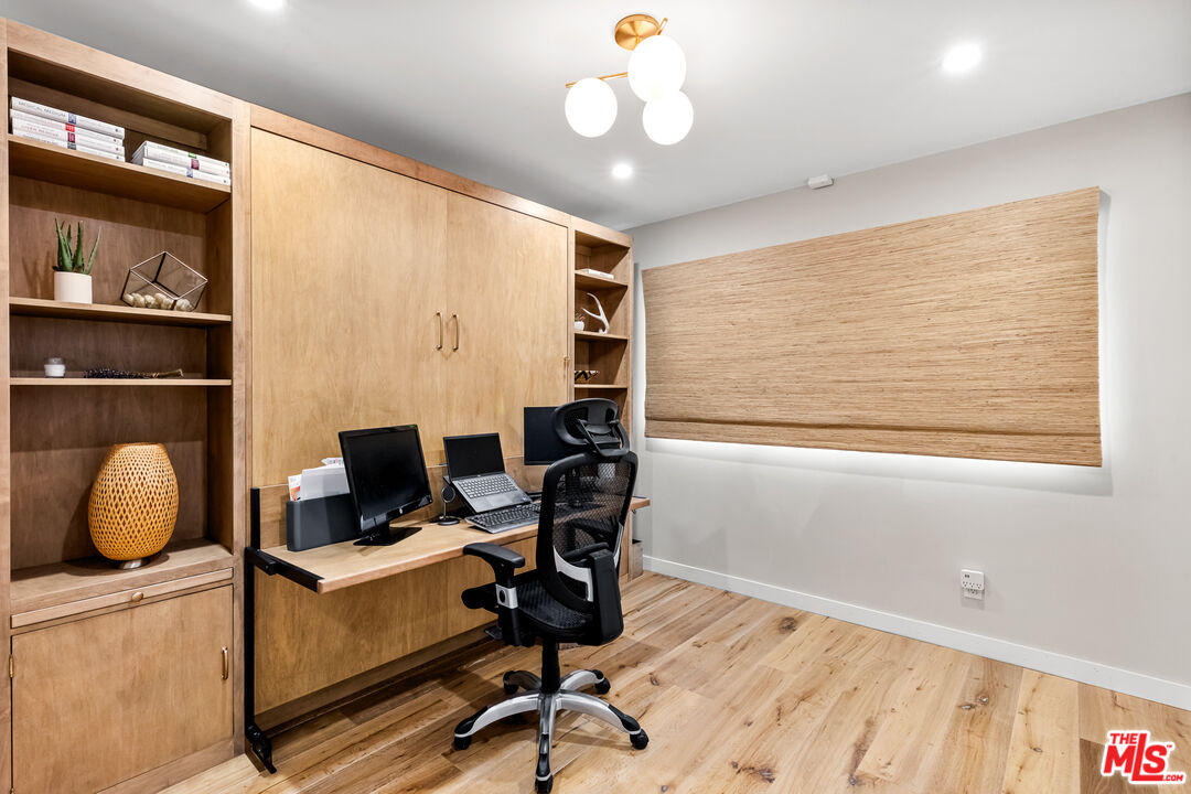 5401 Ostrom Avenue Encino, CA 91316 - Photo 47 of 73 a view of a workspace with furniture