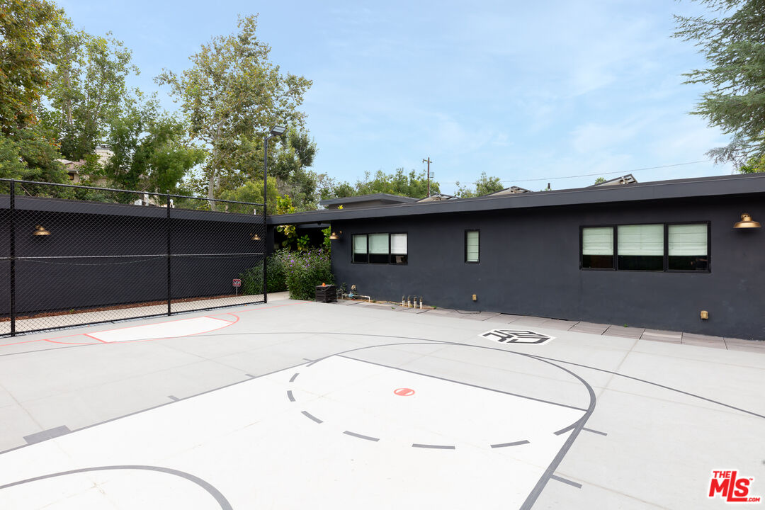 5401 Ostrom Avenue Encino, CA 91316 - Photo 56 of 73 a front view of a house with a garage