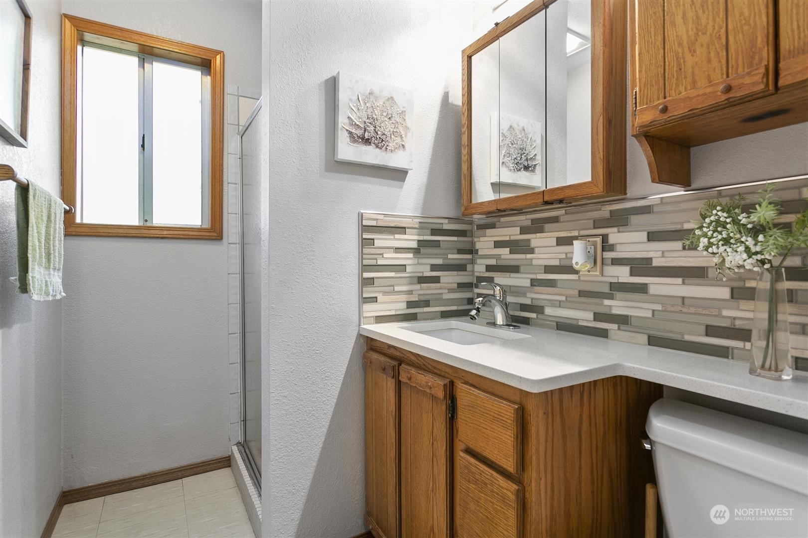 3397 Cedarville Road Bellingham, WA 98226 - Photo 25 of 38 a kitchen with stainless steel appliances a sink and cabinets