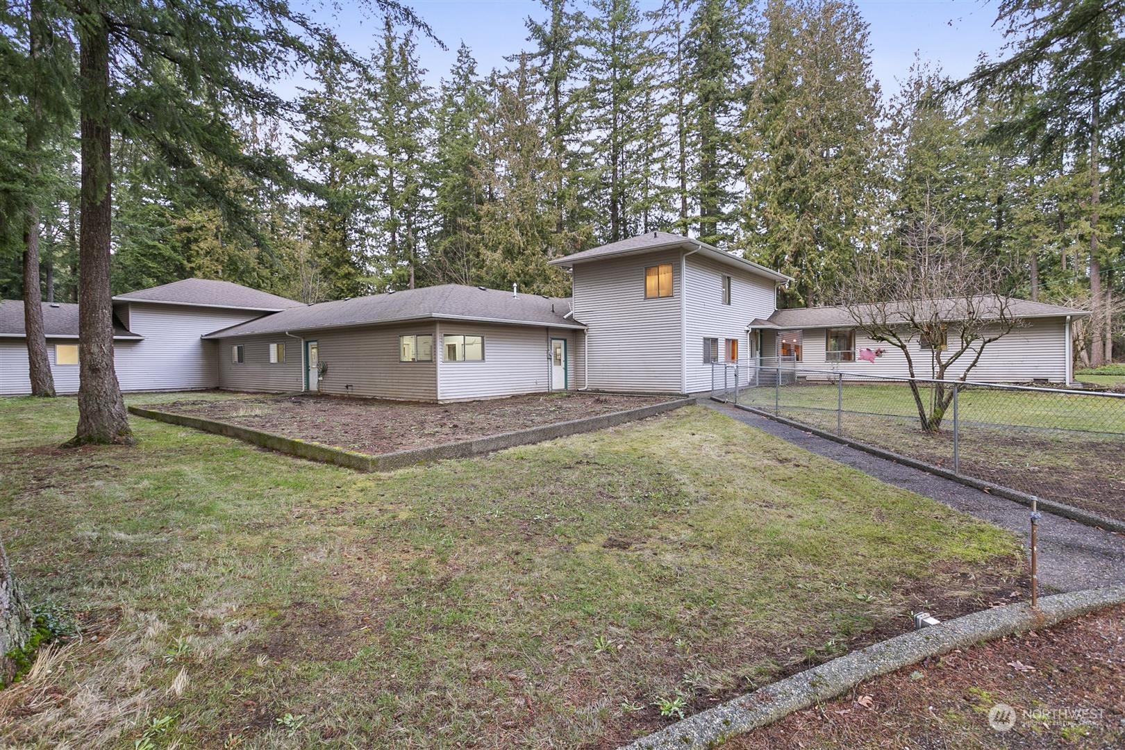 3397 Cedarville Road Bellingham, WA 98226 - Photo 28 of 38 a house with trees in the background